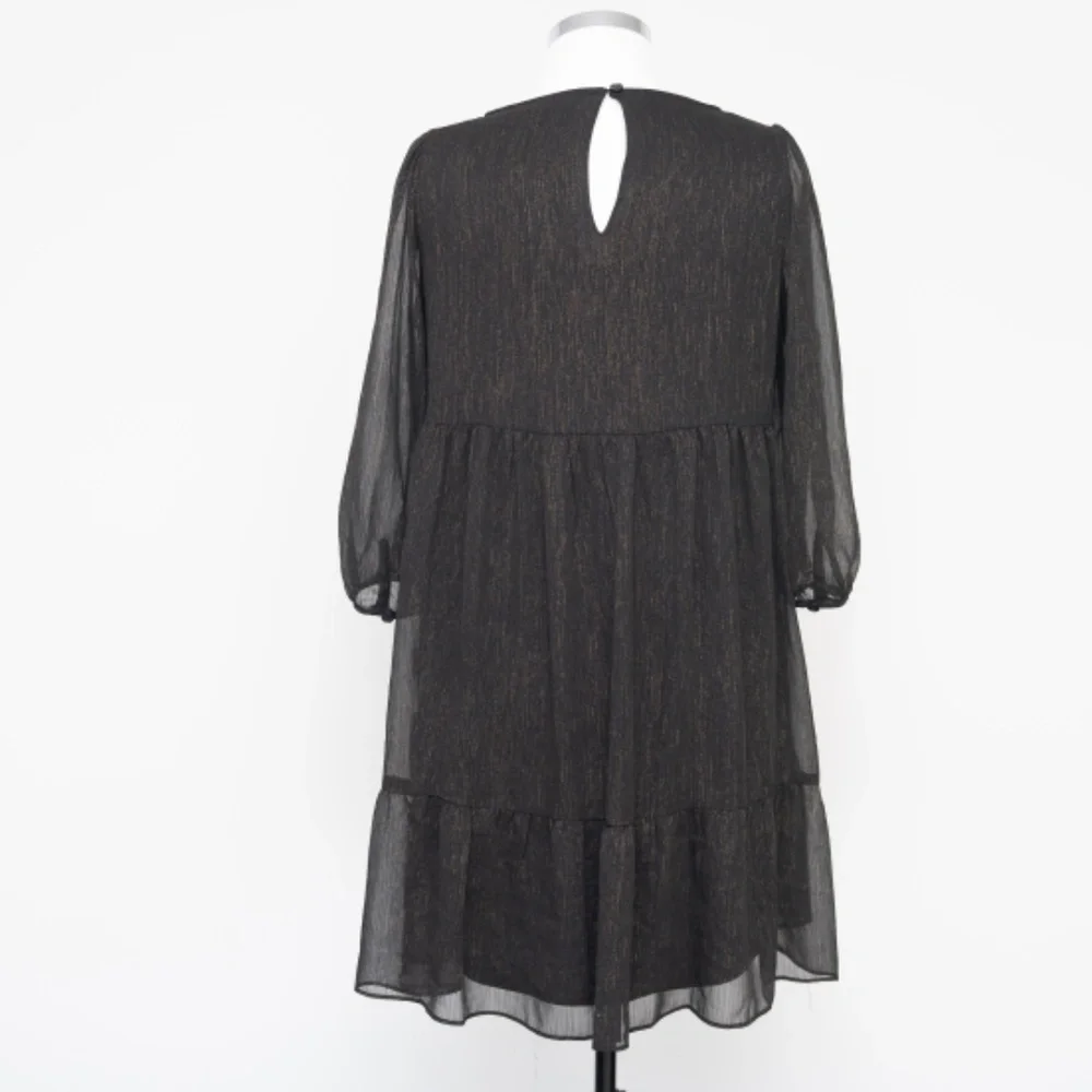 Calvin‎ Klein. Sheer Empire Waist Mini Dress.